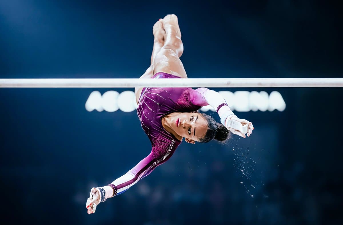 Jennifer Park's precise gymnastics photograph capturing multiple athletes in perfect synchronization during team routine