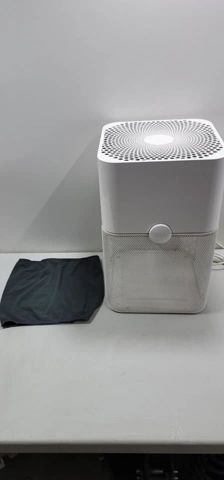 Blue Pure 211+ air purifier in a large living room setting