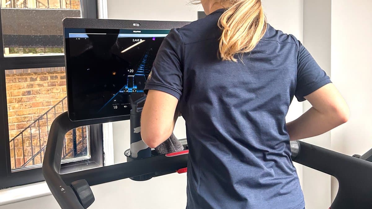 Aviron Victory treadmill with interactive display showing gamified workout interface