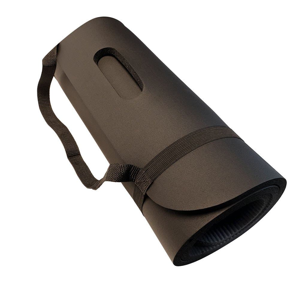 Foam roller and massage tools arranged with exercise mat