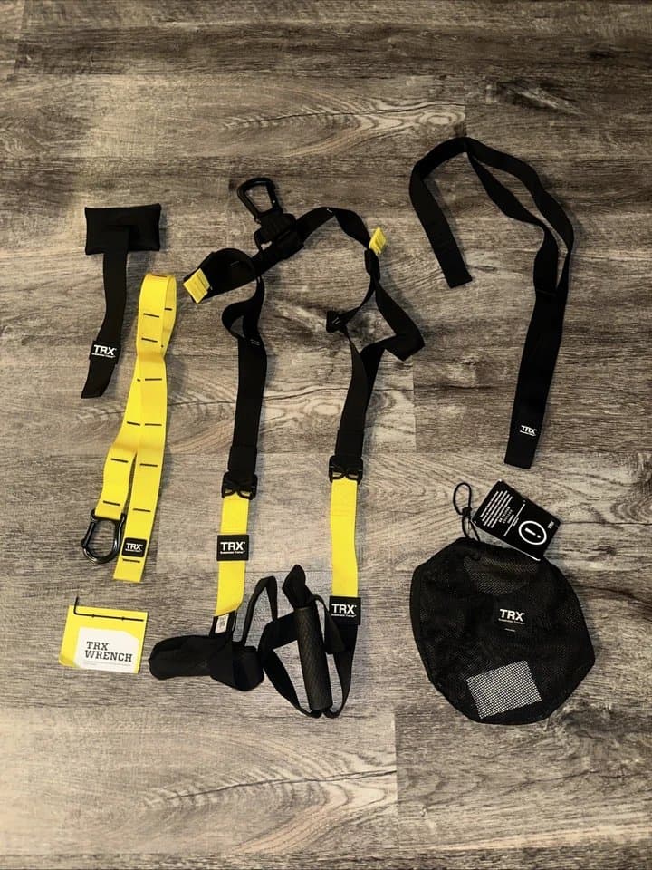 TRX suspension trainer system with straps and handles
