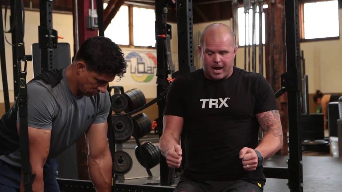 TRX DUO Trainer with resistance bands and suspension trainer components