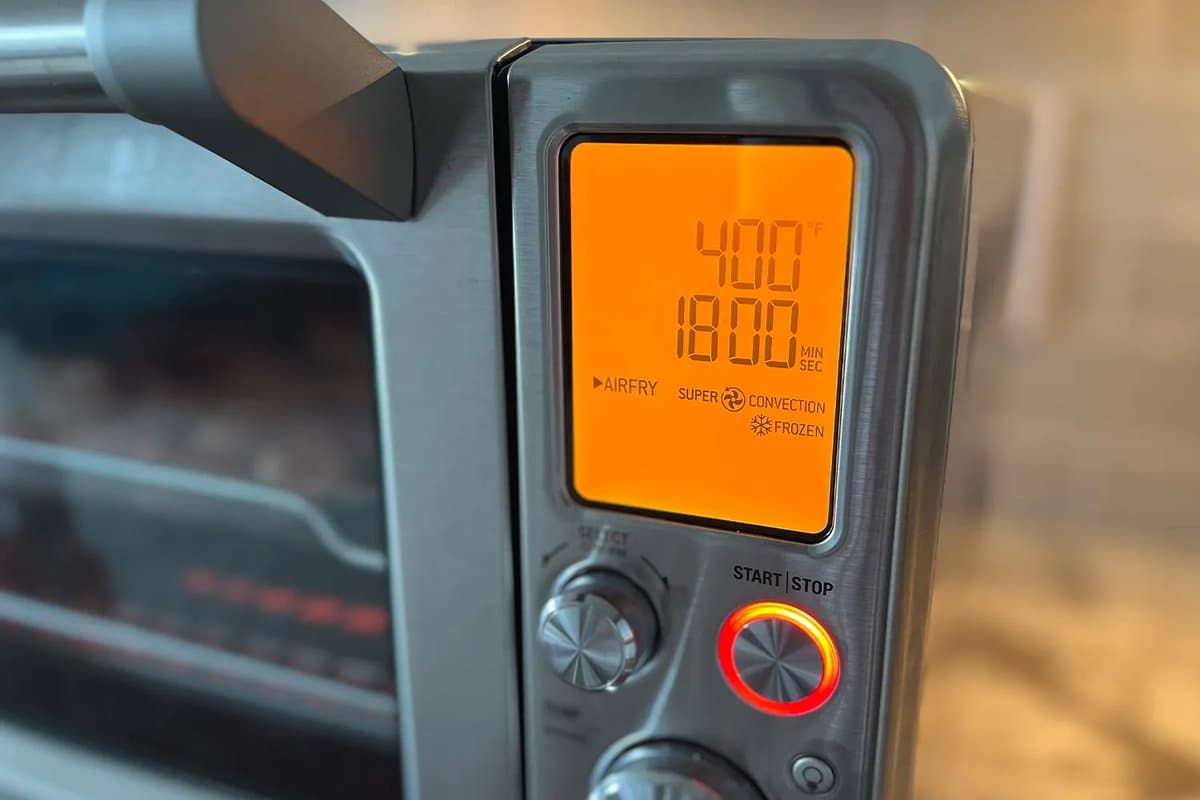 Breville Smart Oven Pro with food inside and digital display